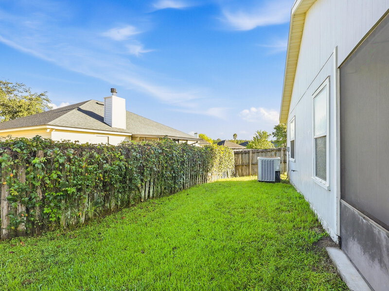 1,895/Mo, 1880 Pineta Cove Drive Middleburg, FL 32068 Backyard View