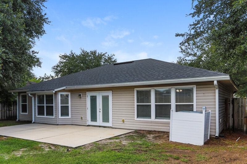 1,745/Mo, 7109 Beekman Lake Dr Jacksonville, FL 32222 Rear View