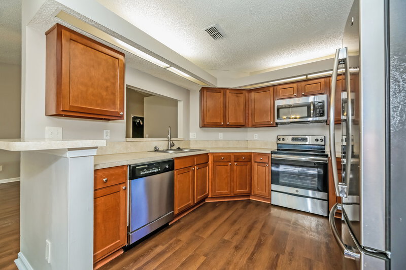 2,025/Mo, 2863 Sandy Beach Ln Jacksonville, FL 32277 Kitchen View 2