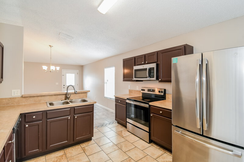 2,690/Mo, 8706 Star Leaf Rd N Jacksonville, FL 32210 Kitchen View 2