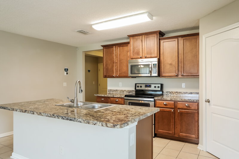 1,915/Mo, 3251 Canyon Falls Dr Green Cove Springs, FL 32043 Kitchen View 2