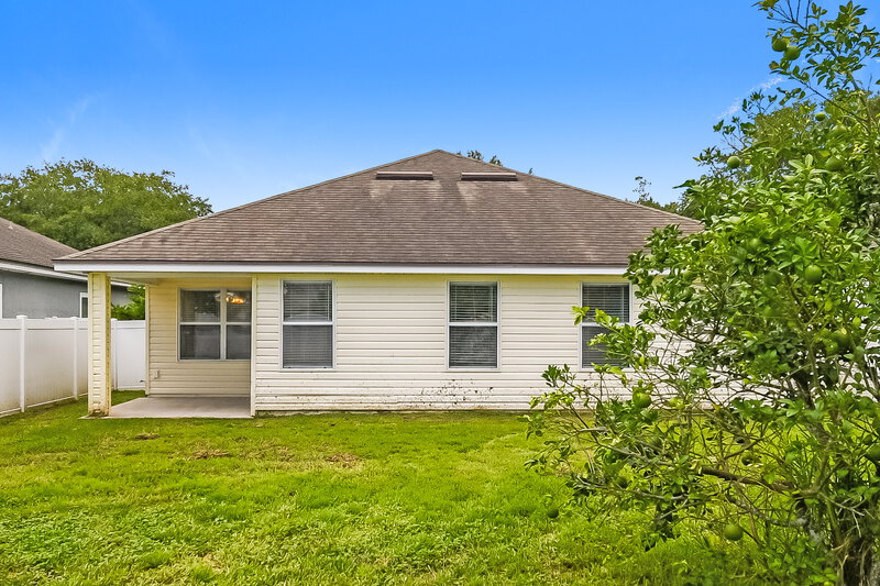 1,670/Mo, 607 Sunny Stroll Dr Middleburg, FL 32068 Rear View