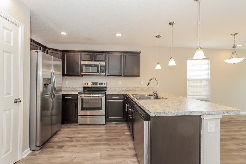 2,030/Mo, 7317 Townsend Village Ln Jacksonville, FL 32277 Kitchen View 2