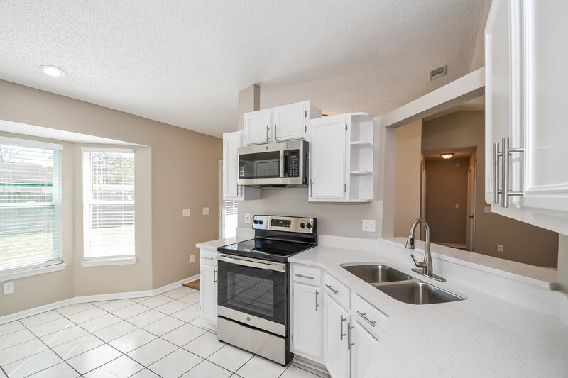 1,730/Mo, 8294 Sailmaker Ln Jacksonville, FL 32210 Kitchen View