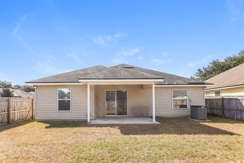 1,950/Mo, 8077 Welbeck Ln Jacksonville, FL 32244 Rear View