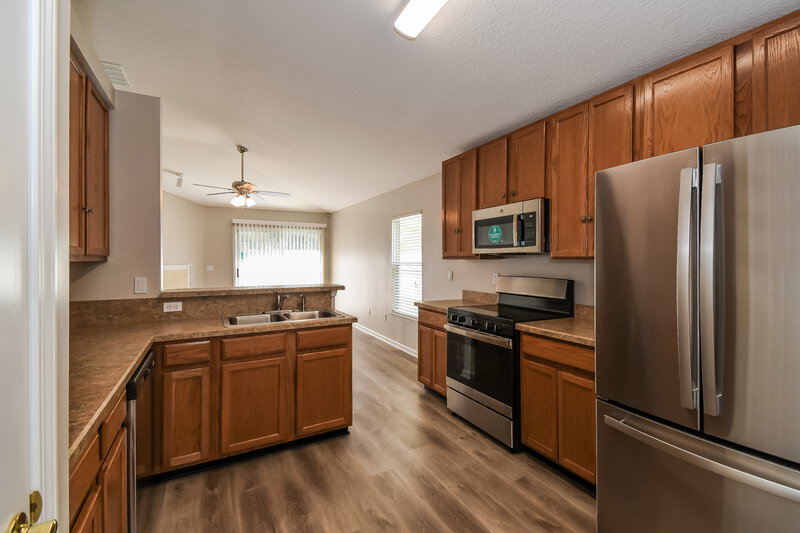 1,875/Mo, 1639 Canopy Oaks Dr Orange Park, FL 32065 Kitchen View 2
