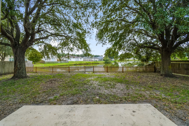 1,690/Mo, 8554 N Star Leaf Rd Jacksonville, FL 32210 Backyard View
