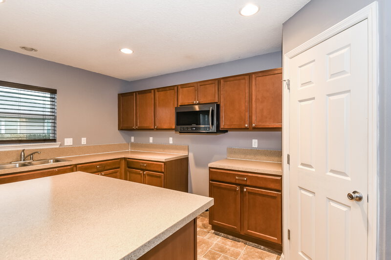 1,990/Mo, 7472 Mishkie Dr Jacksonville, FL 32244 Kitchen View
