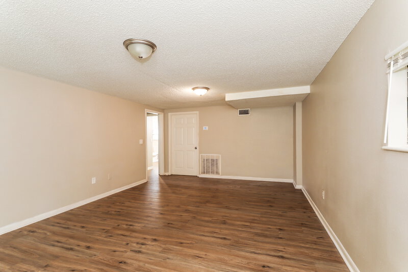 1,620/Mo, 7312 Laura St N Jacksonville, FL 32208 Family Room View
