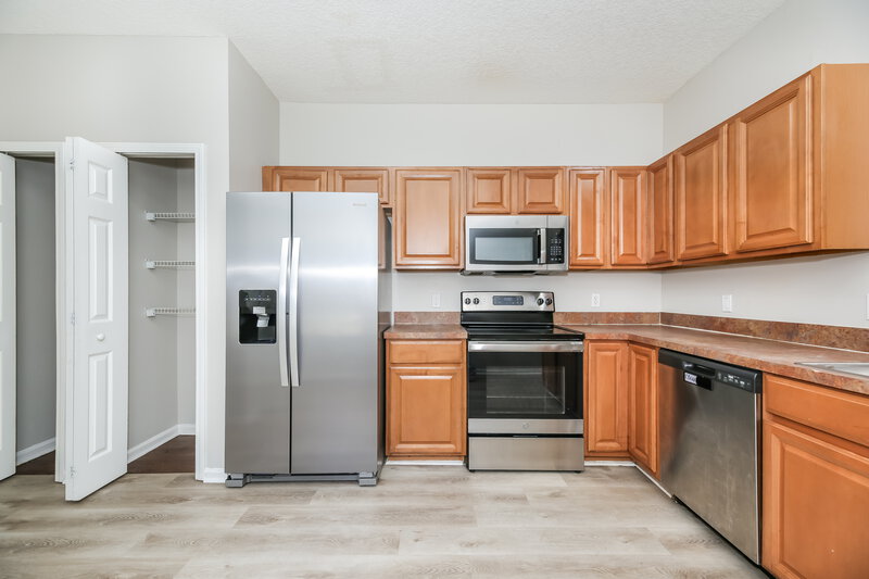 1,735/Mo, 7911 Melvin Rd Jacksonville, FL 32210 Kitchen View