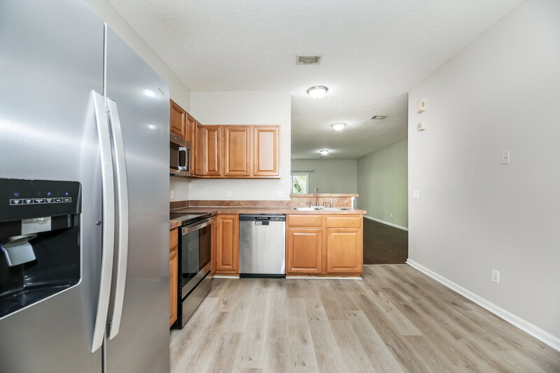 1,735/Mo, 7911 Melvin Rd Jacksonville, FL 32210 Kitchen View 2