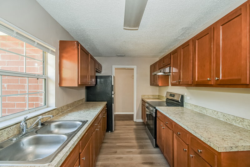 1,480/Mo, 908 Deerwood Cir S Jacksonville, FL 32208 Kitchen View 2