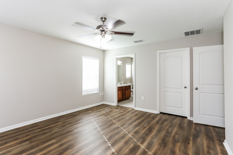 1,810/Mo, 8769 Oxfordshire Ave E Jacksonville, FL 32219 Main Bedroom View