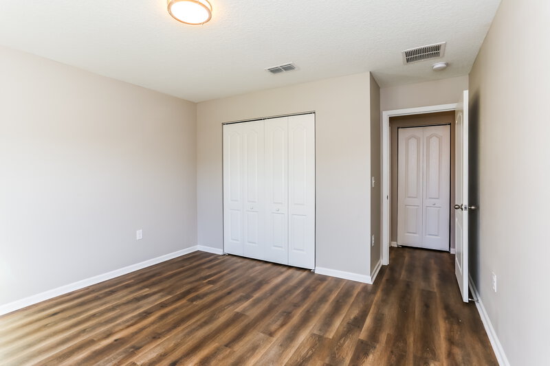 1,810/Mo, 8769 Oxfordshire Ave E Jacksonville, FL 32219 Bedroom View