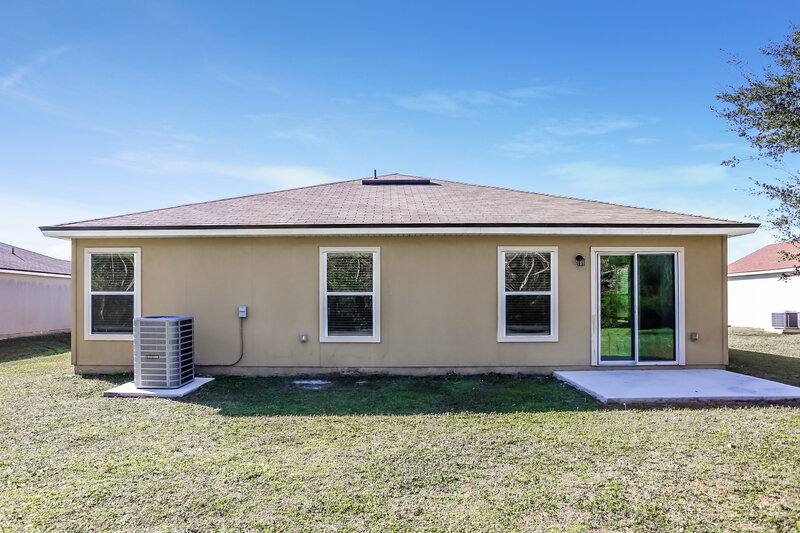 1,810/Mo, 8769 Oxfordshire Ave E Jacksonville, FL 32219 Rear View
