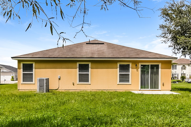 1,865/Mo, 8769 Oxfordshire Ave E Jacksonville, FL 32219 Rear View