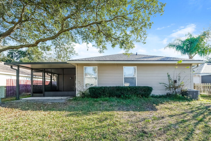 1,810/Mo, 13556 Ashford Wood Ct E Jacksonville, FL 32218 Rear View