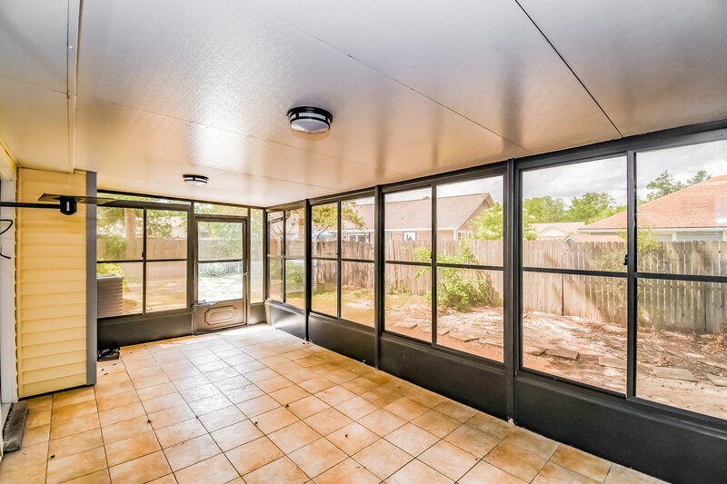 1,800/Mo, 8431 Moss Pointe Trl N Jacksonville, FL 32244 Screen Porch View