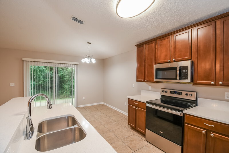 1,900/Mo, 10243 Normandy Cove St Jacksonville, FL 32221 Kitchen View 2