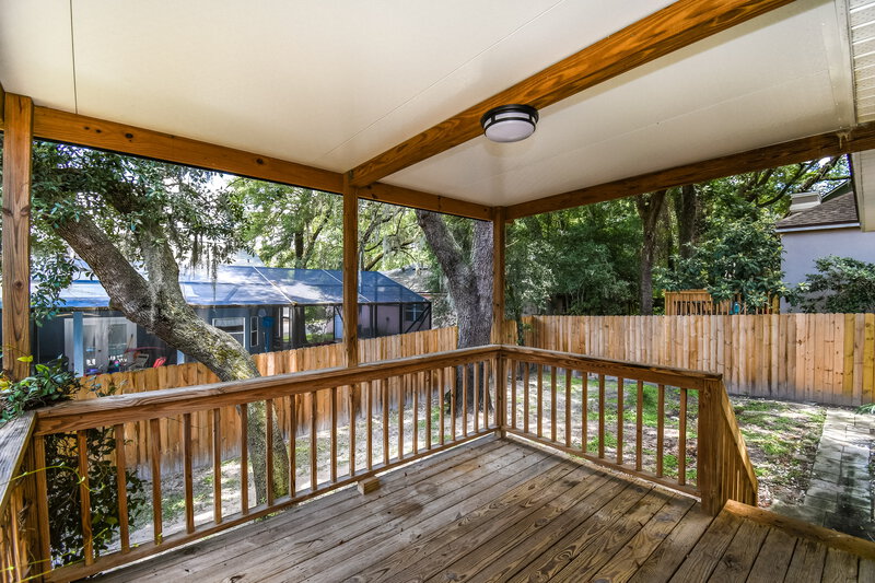 2,075/Mo, 6119 Winding Bridge Dr Jacksonville, FL 32277 Covered Deck View