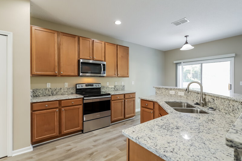 2,595/Mo, 4703 Pine Lake Dr Middleburg, FL 32068 Kitchen View 2
