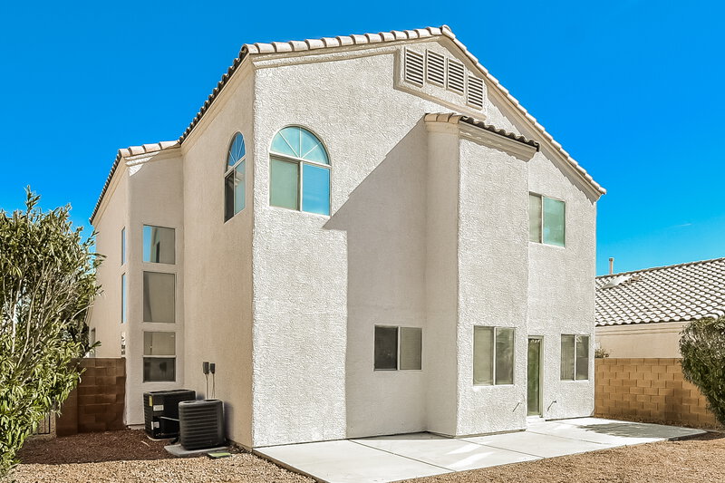 2,300/Mo, 7661 Rainbow Cove Dr Las Vegas, NV 89131 Rear View