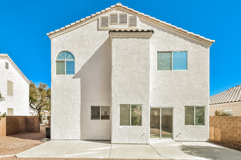 2,300/Mo, 7661 Rainbow Cove Dr Las Vegas, NV 89131 Rear View 2