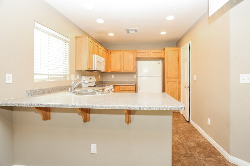 2,060/Mo, 9527 Milkweed Canyon Ave Las Vegas, NV 89166 Kitchen View