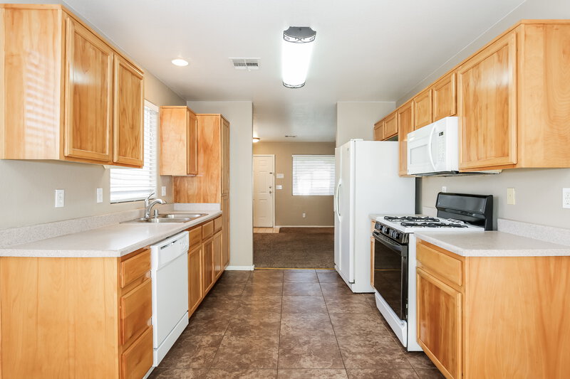 1,940/Mo, 4829 Peaceful Pond Ave Las Vegas, NV 89131 Kitchen View