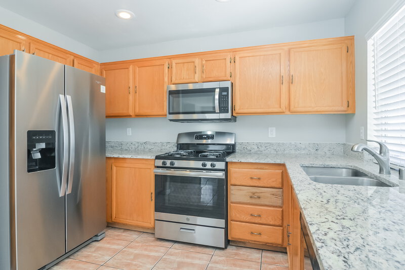 1,940/Mo, 4910 Rancho Domingo Ct. North Las Vegas, NV 89031 Kitchen View 2