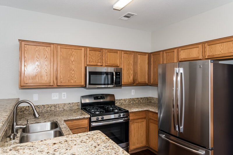 1,750/Mo, 4810 Leadership Court North Las Vegas, NV 89031 Kitchen View 2