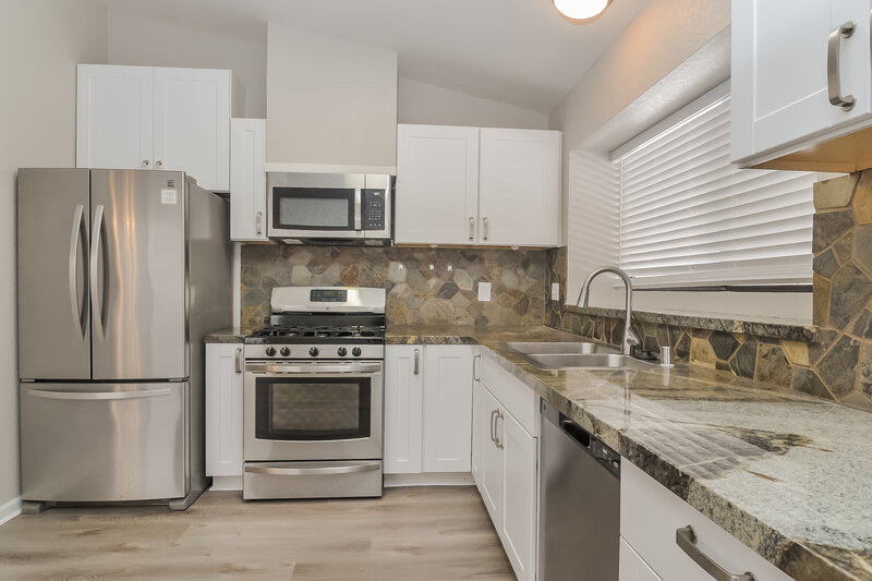 1,980/Mo, 7107 Rhapsody Ln Las Vegas, NV 89119 Kitchen View 2
