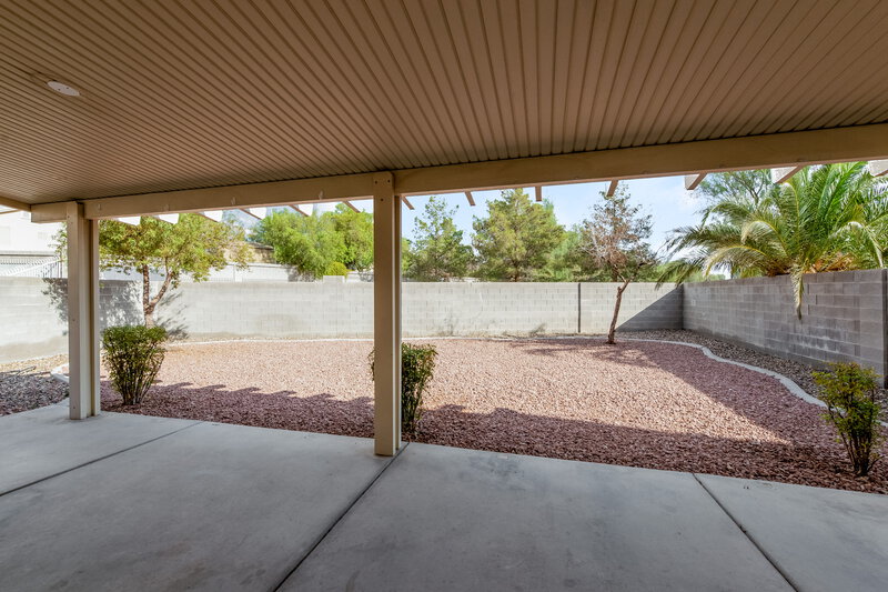 1,990/Mo, 5044 Drifting Creek Ave Las Vegas, NV 89130 Covered Porch View