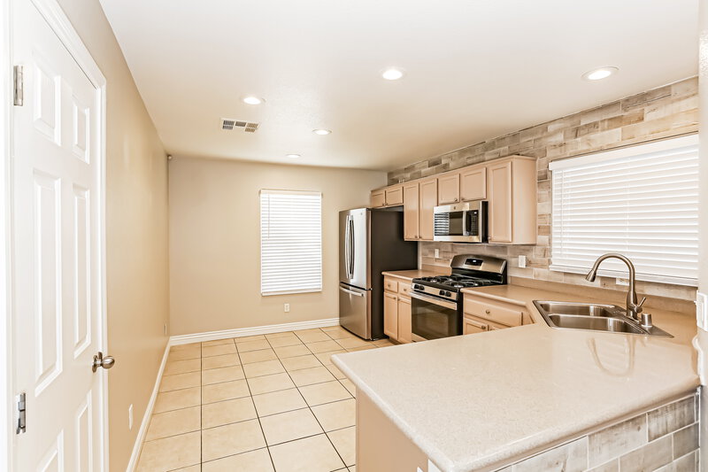 2,150/Mo, 8736 Water Bucket Ave Las Vegas, NV 89143 Kitchen View
