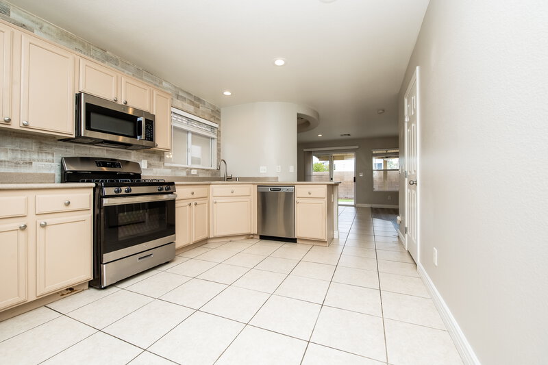 2,025/Mo, 8736 Water Bucket Ave Las Vegas, NV 89143 Kitchen View 2