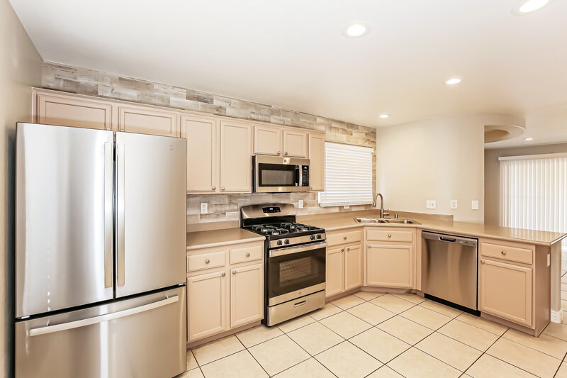 2,150/Mo, 8736 Water Bucket Ave Las Vegas, NV 89143 Kitchen View 2