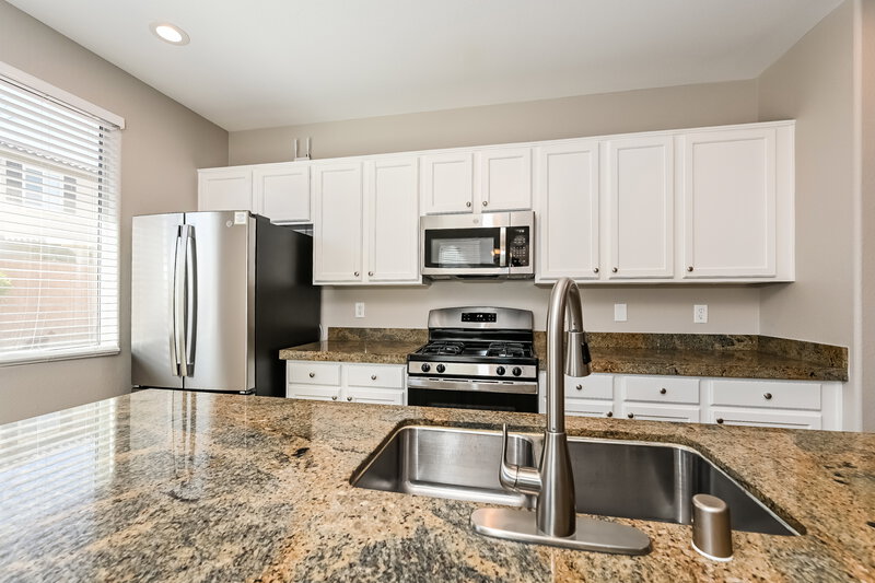 4,930/Mo, 10435 Romoco Ct Las Vegas, NV 89178 Kitchen View 2