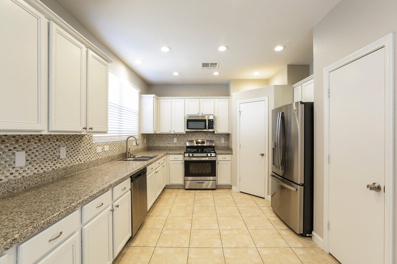 1,895/Mo, 8838 Ashley Park Ave Las Vegas, NV 89148 Kitchen View