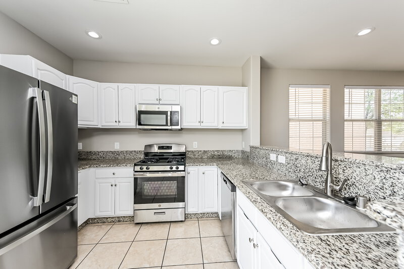 2,690/Mo, 6725 Brick House Ave Las Vegas, NV 89122 Kitchen View