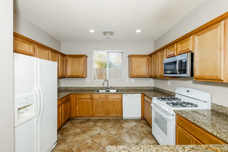 2,250/Mo, 9081 Sheffield Garden Ave Las Vegas, NV 89148 Kitchen View