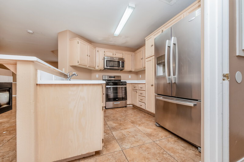 2,300/Mo, 7537 Flat Rock St Las Vegas, NV 89131 Kitchen View