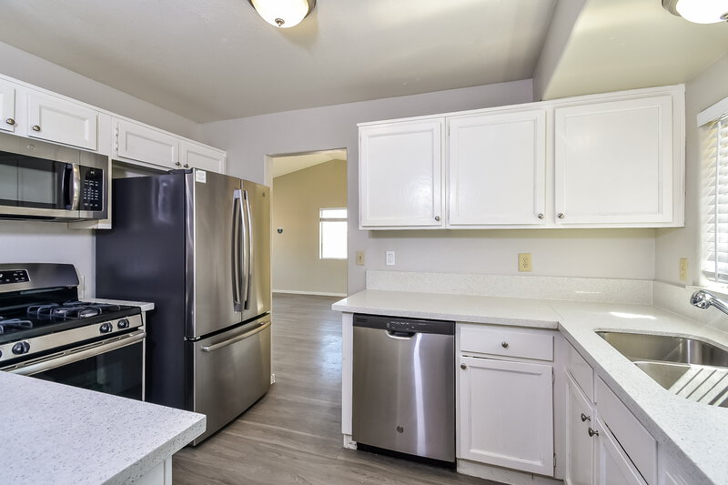 1,950/Mo, 3927 Barker Way North Las Vegas, NV 89032 Kitchen View 2