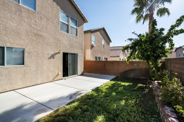 2,180/Mo, 5025 Whistling Acres Ave Las Vegas, NV 89131 Rear View