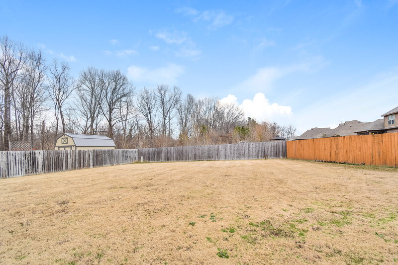 2,375/Mo, 6010 Abigail Bluffs Cove Bartlett, TN 38135 Backyard View