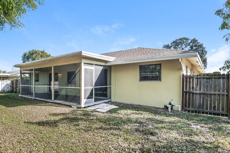 2,850/Mo, 1107 Widgeon Rd Wellington, FL 33414 Rear View