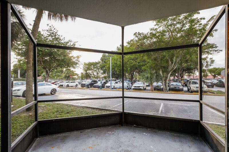 1,740/Mo, 8205 Sw 152Nd Ave # F-112 Miami, FL 33193 Screen Porch View
