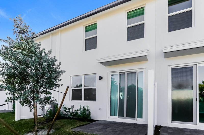 2,870/Mo, 3537 Joshua Tree St Palm Springs, FL 33461 Rear View 2