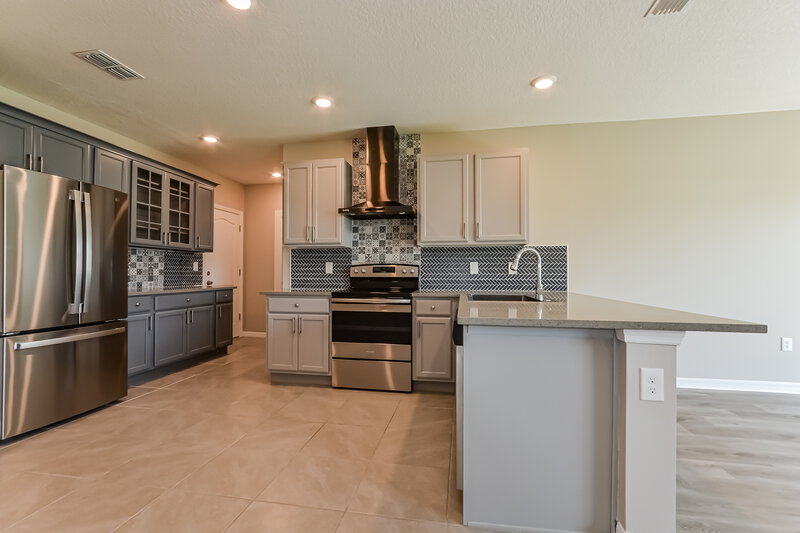 1,875/Mo, 3614 Scarlet Oak Dr Saint Cloud, FL 34772 Kitchen View 2
