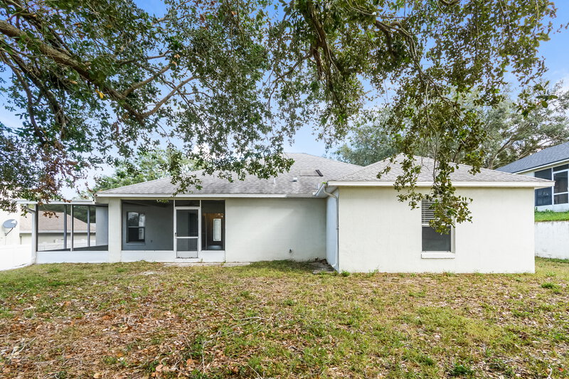2,200/Mo, 1128 Windy Bluff Dr Minneola, FL 34715 Rear View