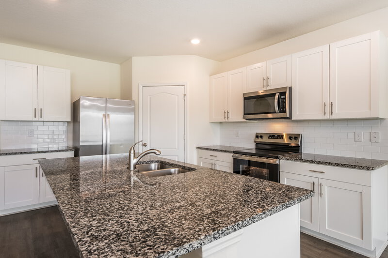 3,170/Mo, 2163 Ranch Side Rd Kissimmee, FL 34744 Kitchen View 2